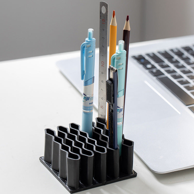 Multifunctional office supplies storage box, capable of holding ointments, makeup brushes and office items